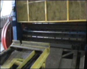 Close-up of corrugated pipe from forming machine