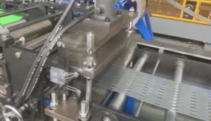 Close-up of forming rolls on the tray roll forming machine